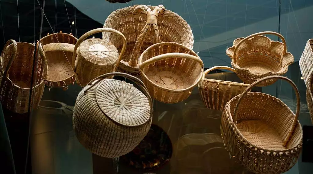 Low angle shot of intricately woven wicker baskets hanging indoors.